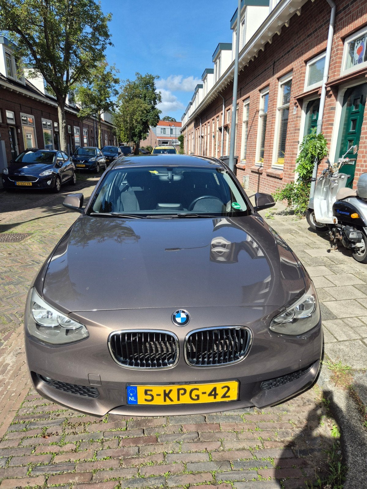 BMW 1-Serie 114I 75KW 5-DR 2013 Bruin, 1-Serie, Achterwielaandrijving, 4 cilinders, Bruin