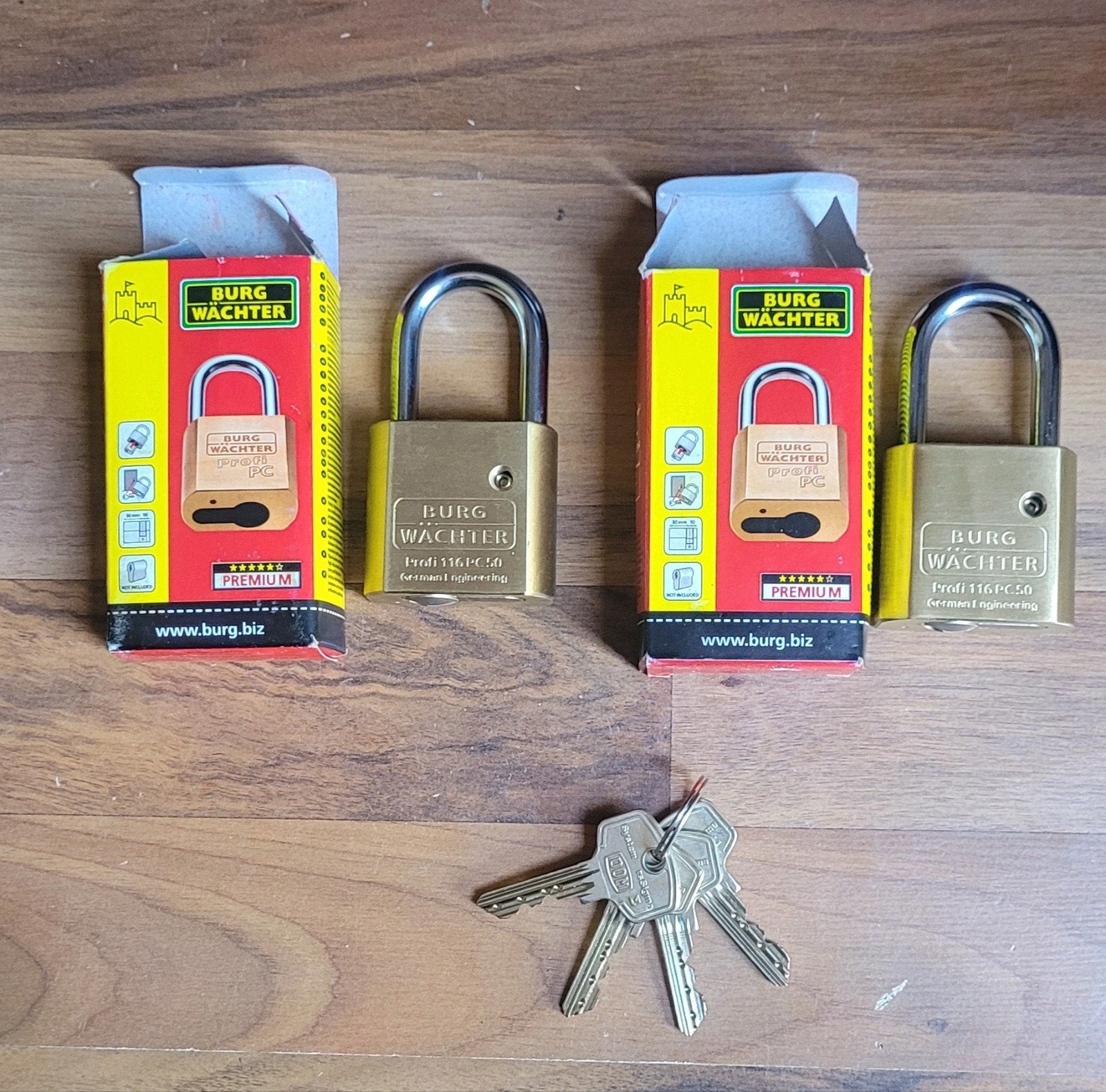 2x Burgwachter Profi 116pc50 hangslot Dom rs sigma, Ophalen of Verzenden, Zo goed als nieuw, Koper of Messing, Slot