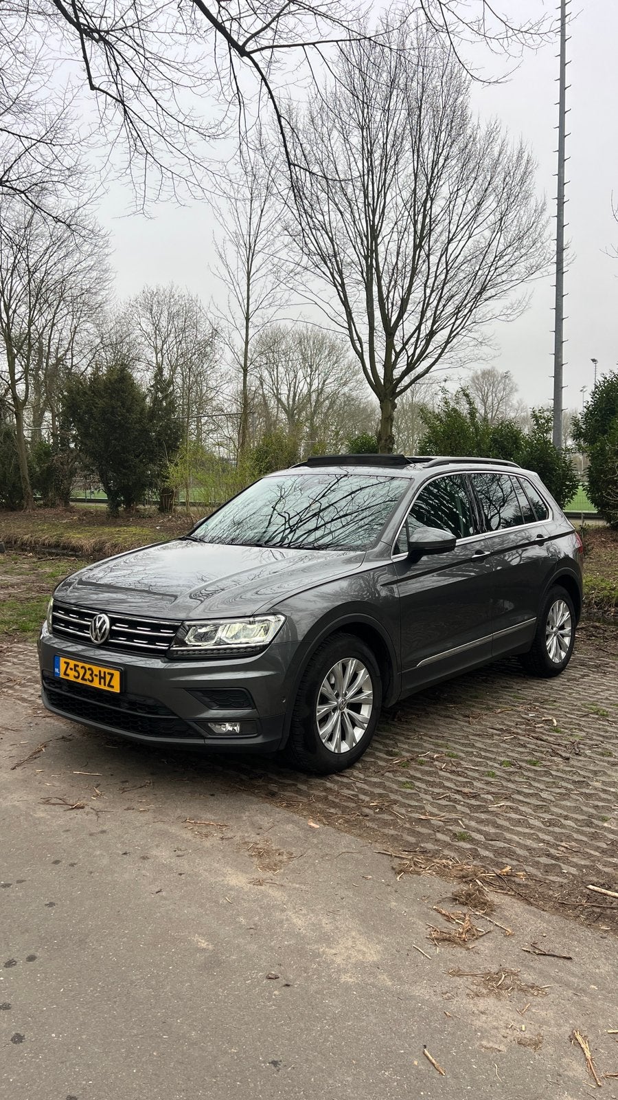 Volkswagen Tiguan 1.5 TSI ACT 150pk DSG 2019 Grijs, Auto's, Stof, 1498 cc, 4 cilinders, 150 pk