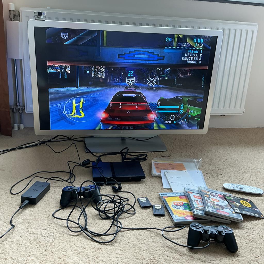 PlayStation 2 Slim met games en controllers, Met 2 controllers, Ophalen of Verzenden, Slim, Gebruikt