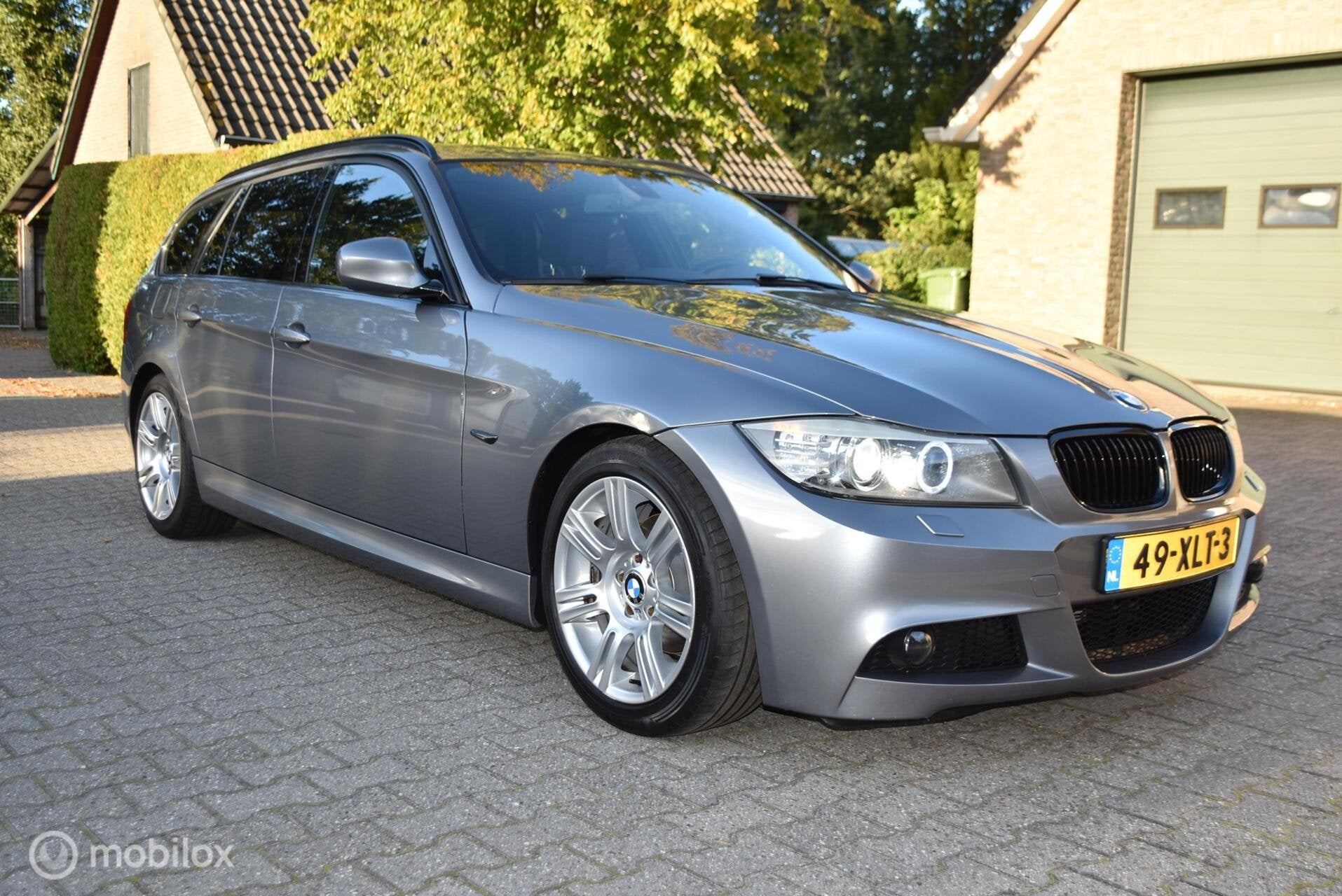 BMW 3-serie Touring 318i Corporate Lease M Sport Edition, Euro 5, Zwart, 4 cilinders, Automatische klimaatregeling