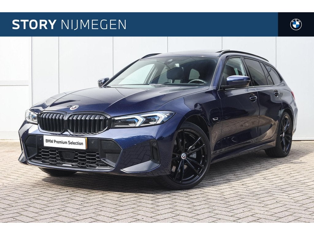 BMW 3 Serie Touring 330e xDrive M Sport Automaat / Trekhaak, Auto's, BMW, 1998 cc, Gebruikt, Met garantie (alle), Blauw