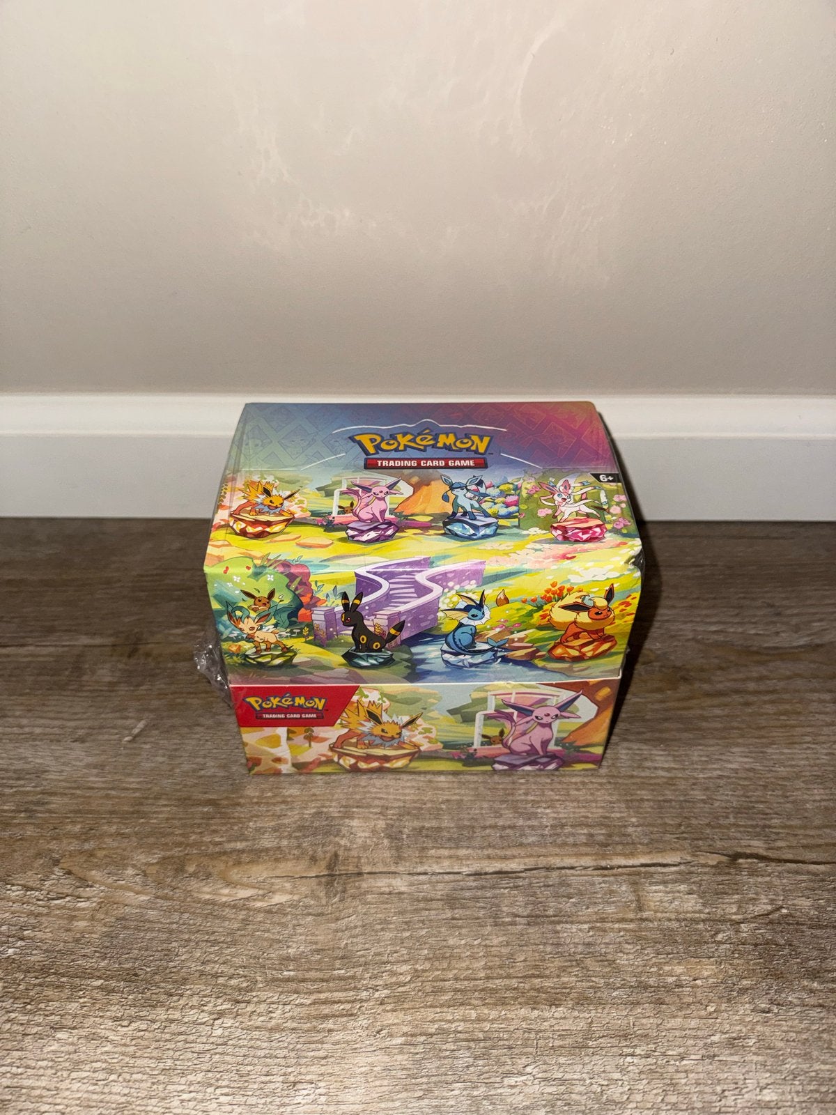Pokemon Prismatic Evolutions Tins SEALED, Hobby en Vrije tijd, Verzenden, Nieuw, Boosterbox
