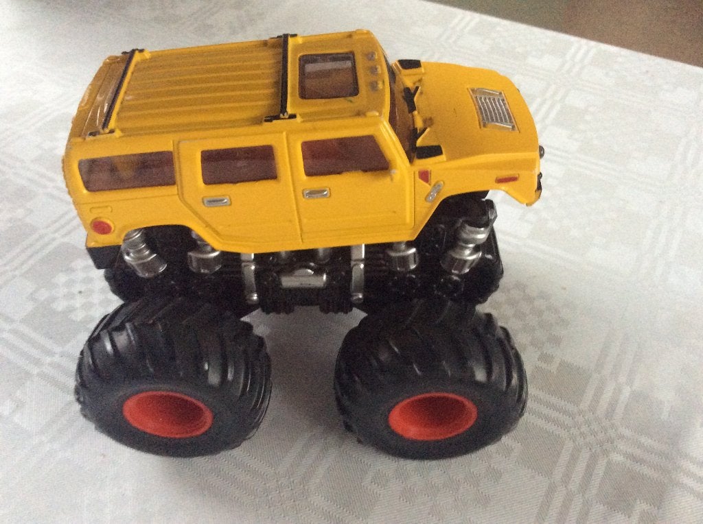 Gele Monster Truck met Grote Wielen (4,5 cm), Ophalen of Verzenden, Zo goed als nieuw