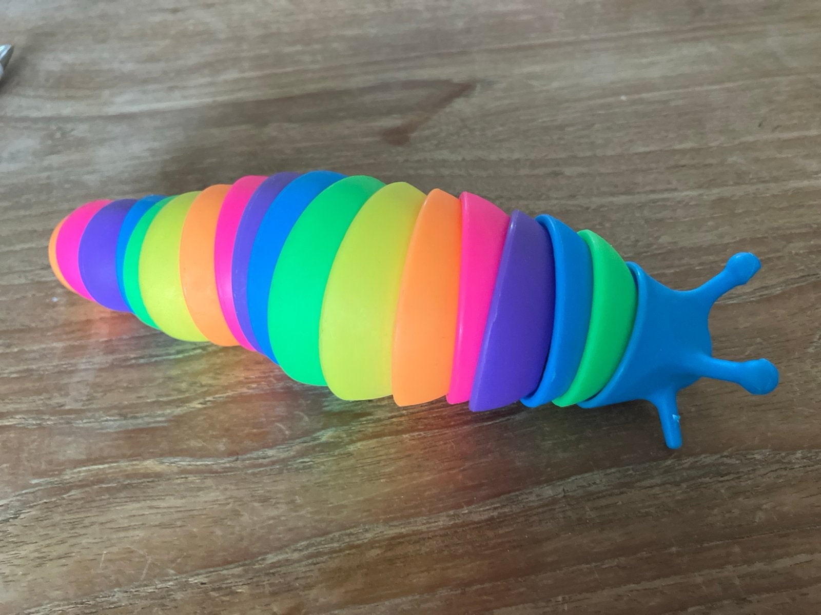 Kleurrijke Regenboog Slak Fidget Toy, Ophalen of Verzenden, Zo goed als nieuw, Jongen of Meisje