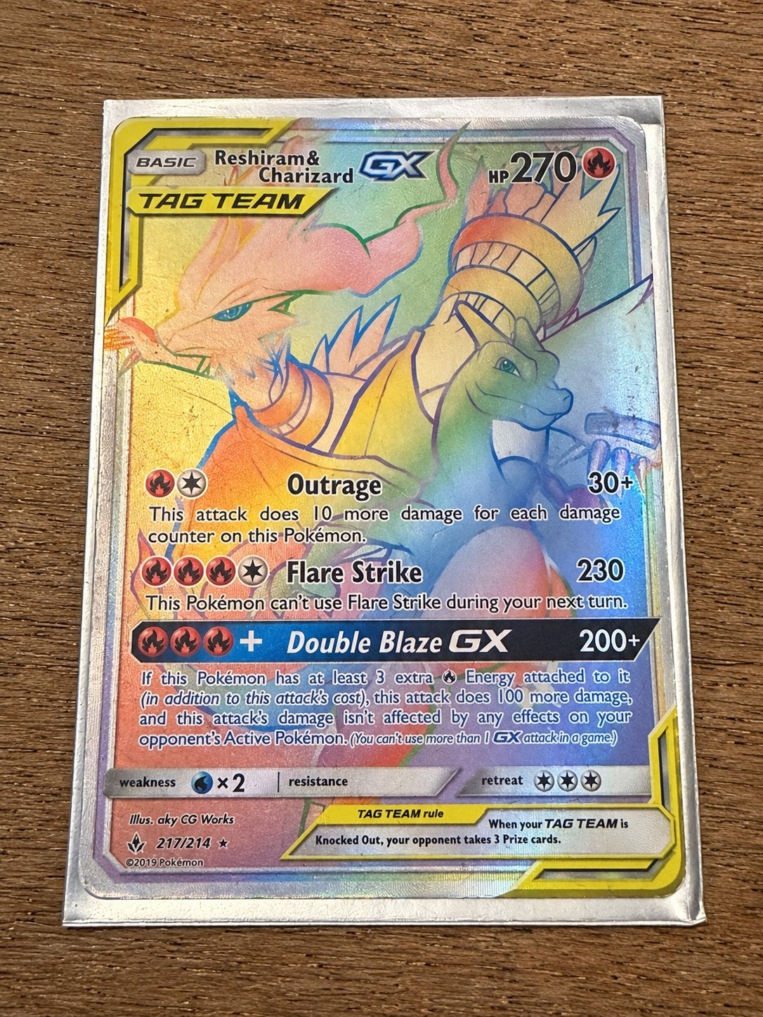 Reshiram & Charizard GX Rainbow 217/214 – Unbroken Bonds, Ophalen of Verzenden, Nieuw