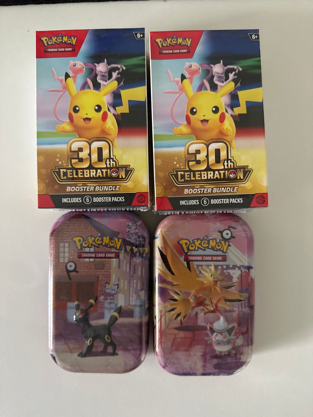 Pokémon 30th Celebration Tins en Booster Bundles, Ophalen, Zo goed als nieuw, Overige typen