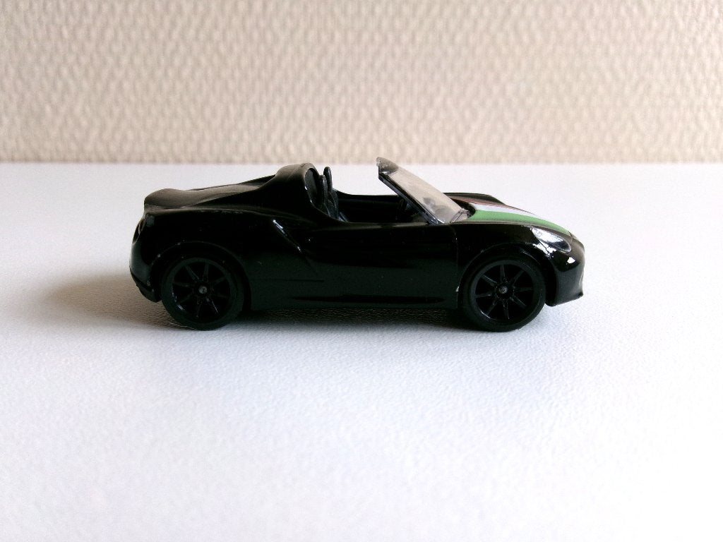 Alfa Romeo 4C Spider zwart 1:57 Majorette (zonder ovp), Ophalen of Verzenden, Gebruikt, Auto