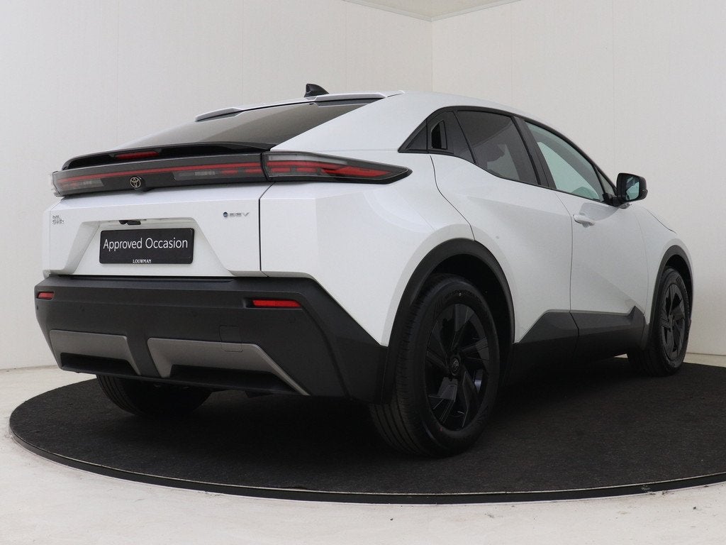 Toyota C-HR+ First Edition 77 kWh " Direct Leverbaar ", Auto's, Toyota, 12 maanden, Leder en Stof, Wit, Nieuw
