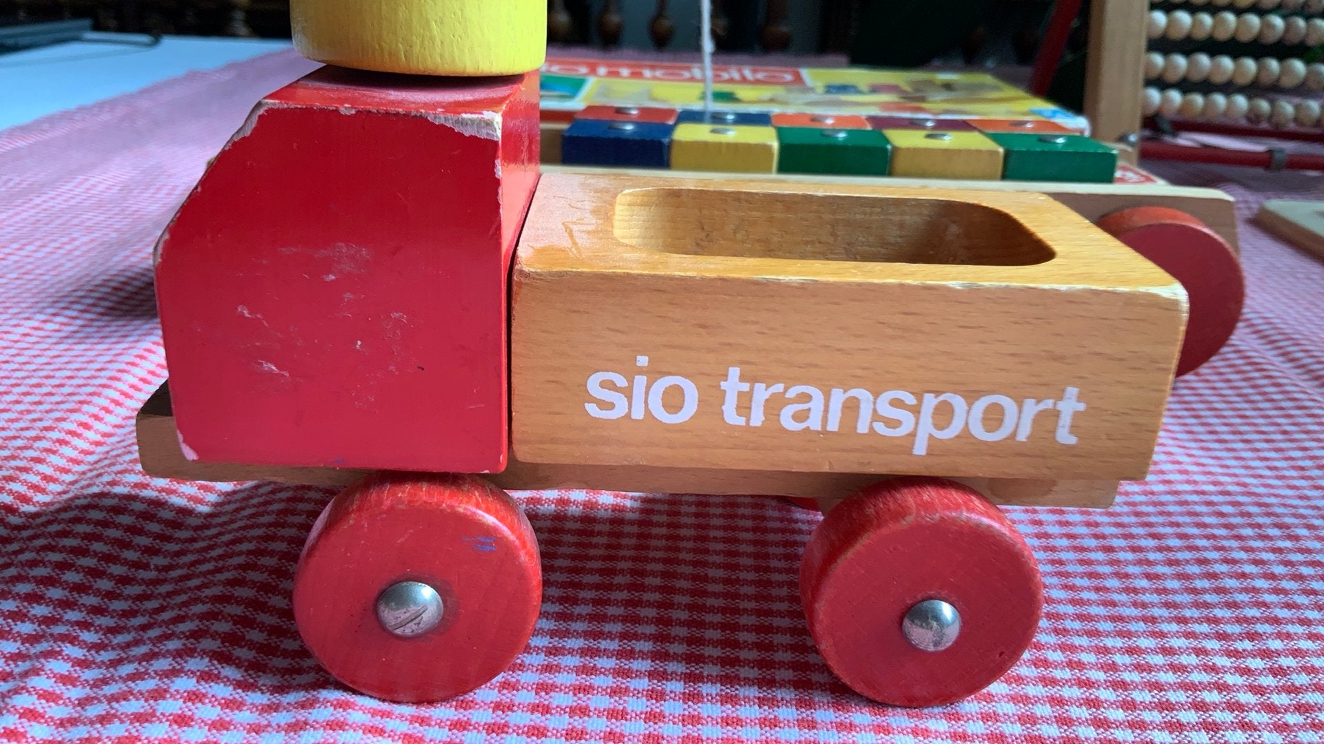 Vintage houten SIO transportauto met metalen label, Antiek en Kunst, Antiek | Speelgoed, Ophalen of Verzenden