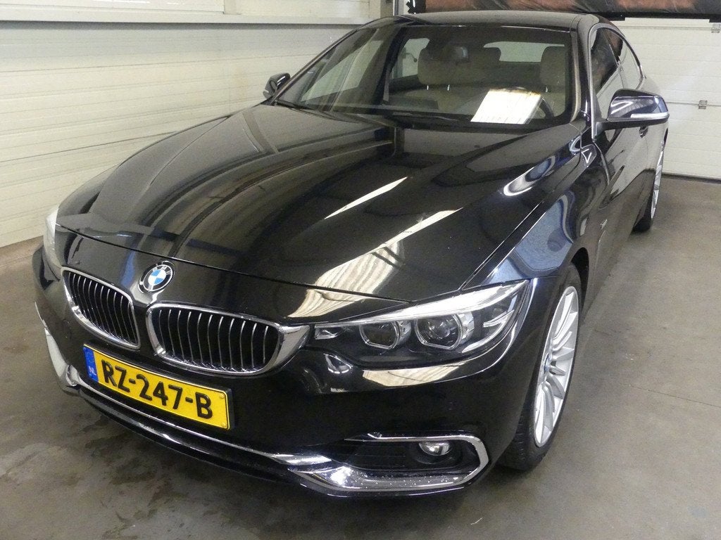 BMW 4-serie Gran Coupé 418i High Executive - Stoelverwarmin, Auto's, Gebruikt, Zwart, 3 cilinders, Onderhoudsboekje