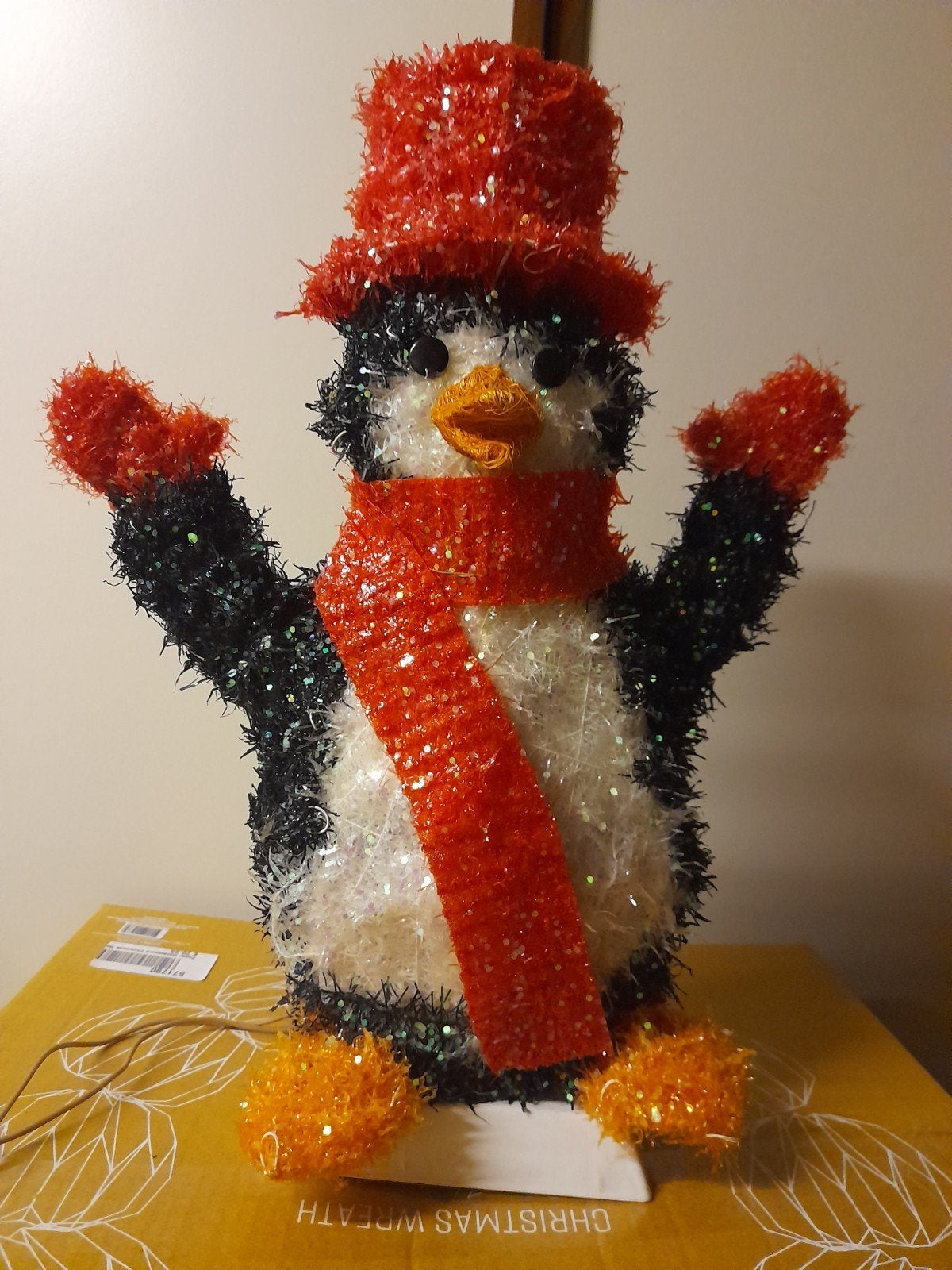 Kerst lichtgevende pinguïn, Ophalen