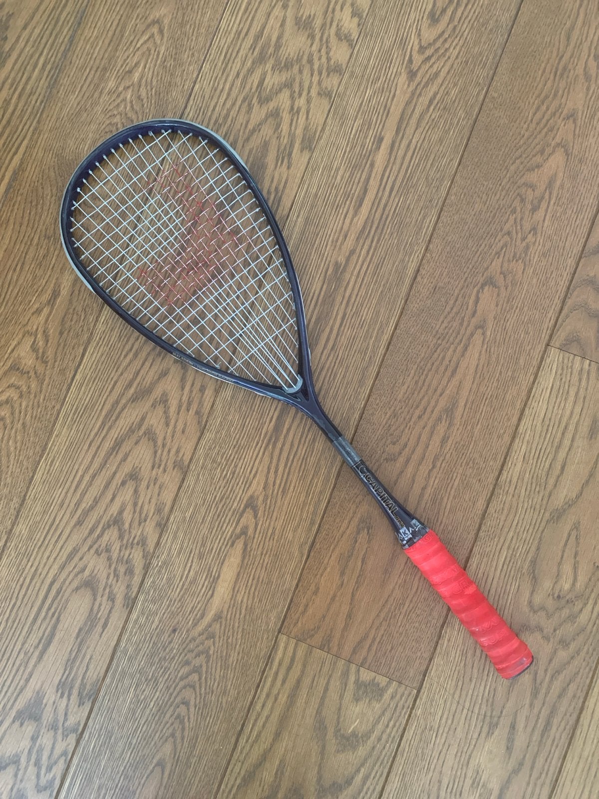 Squashracket met rode grip - Gebruikt, Ophalen of Verzenden, Gebruikt, Racket