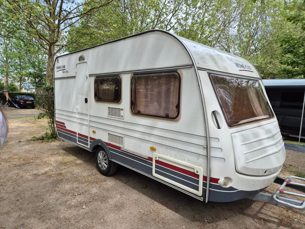 Home-car 43 Racer Jive met stapelbed voortent en luifel, Caravans en Kamperen, Caravans, Home-car, Treinzit, Particulier, 4 tot 5 meter