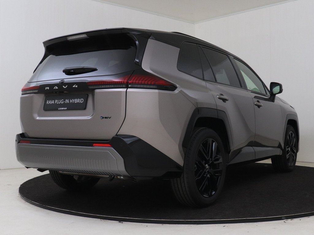 Toyota RAV4 2.5 Hybrid 222 First Edition | DEMO & SNEL LEVER, Auto's, Toyota, Zwart, 4 cilinders, Beige, Bedrijf