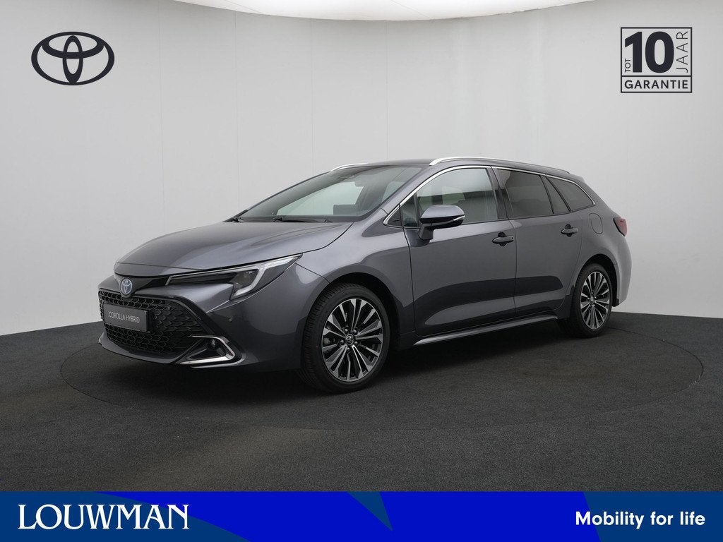 Toyota Corolla Touring Sports Hybrid 200 PK Dynamic || Nieuw, Auto's, Toyota, 12 maanden, Stof, Zwart, 4 cilinders