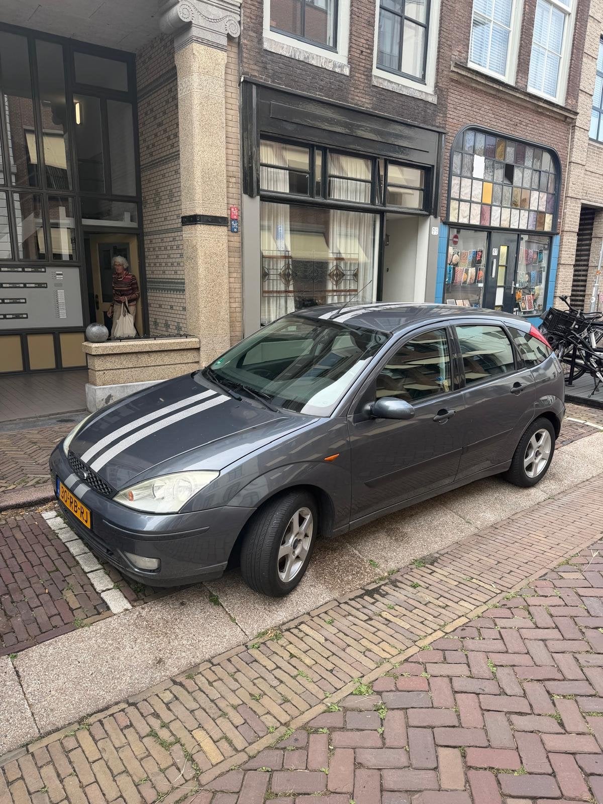 Ford Focus 1.6 I Ghia 2005 Grijs, 1596 cc, 15 km/l, 4 cilinders, 100 pk