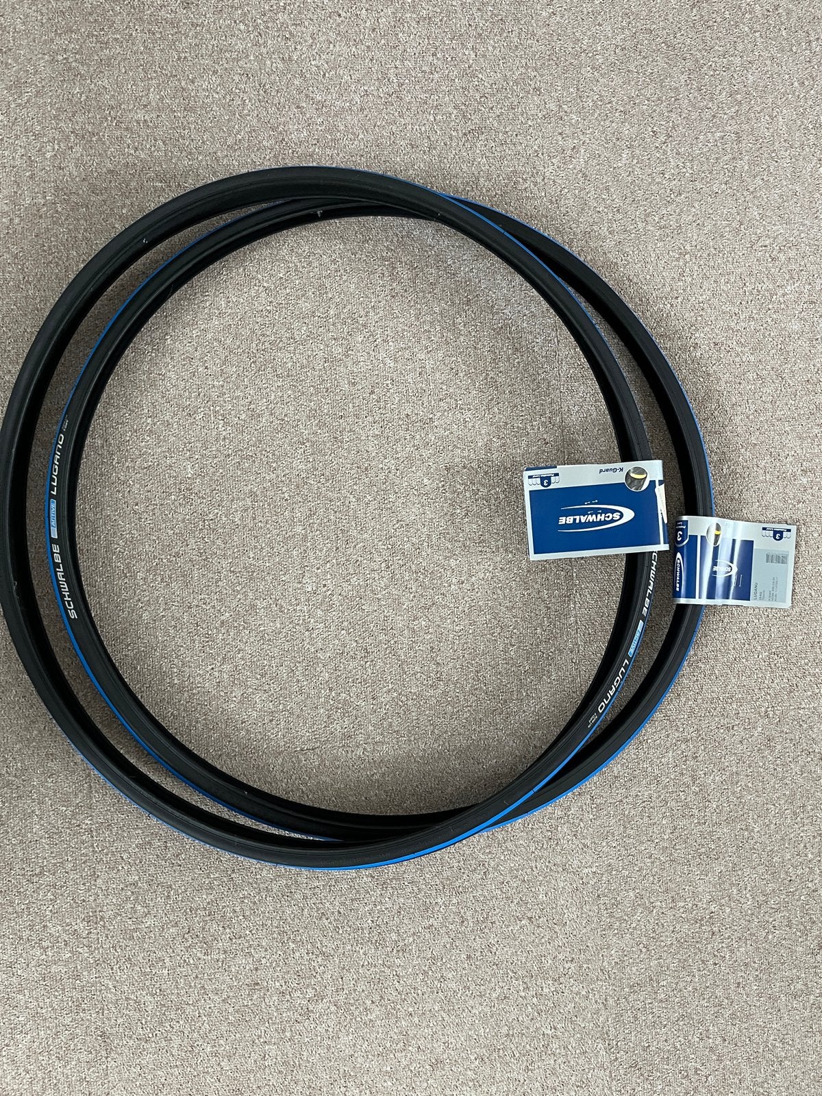 Schwalbe Lugano Racefiets Buitenband 23-622 Zwart/Lichtblauw, Ophalen, Band, Nieuw, Rubber