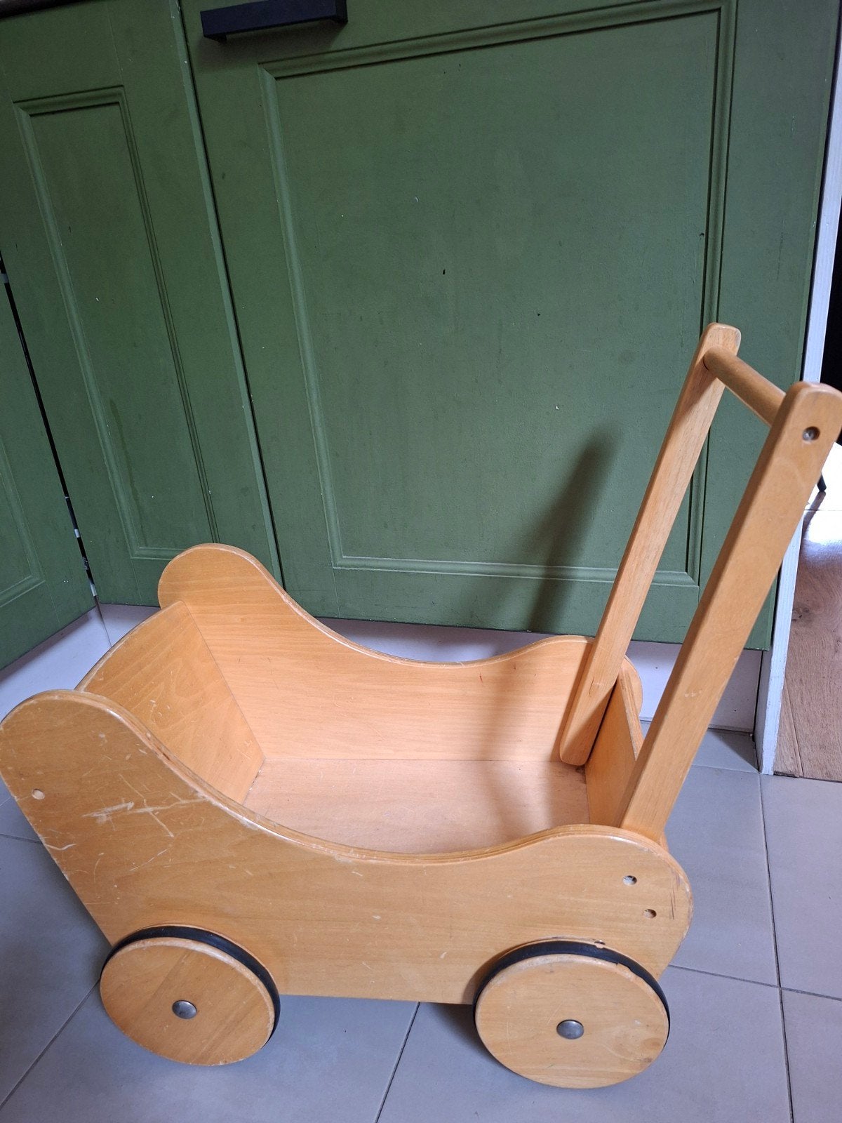 Houten poppenwagen, Ophalen, Gebruikt