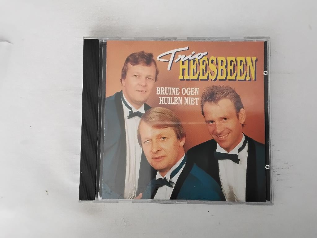 trio heesbeen - bruine ogen huilen niet, Ophalen of Verzenden, Zo goed als nieuw, Levenslied of Smartlap