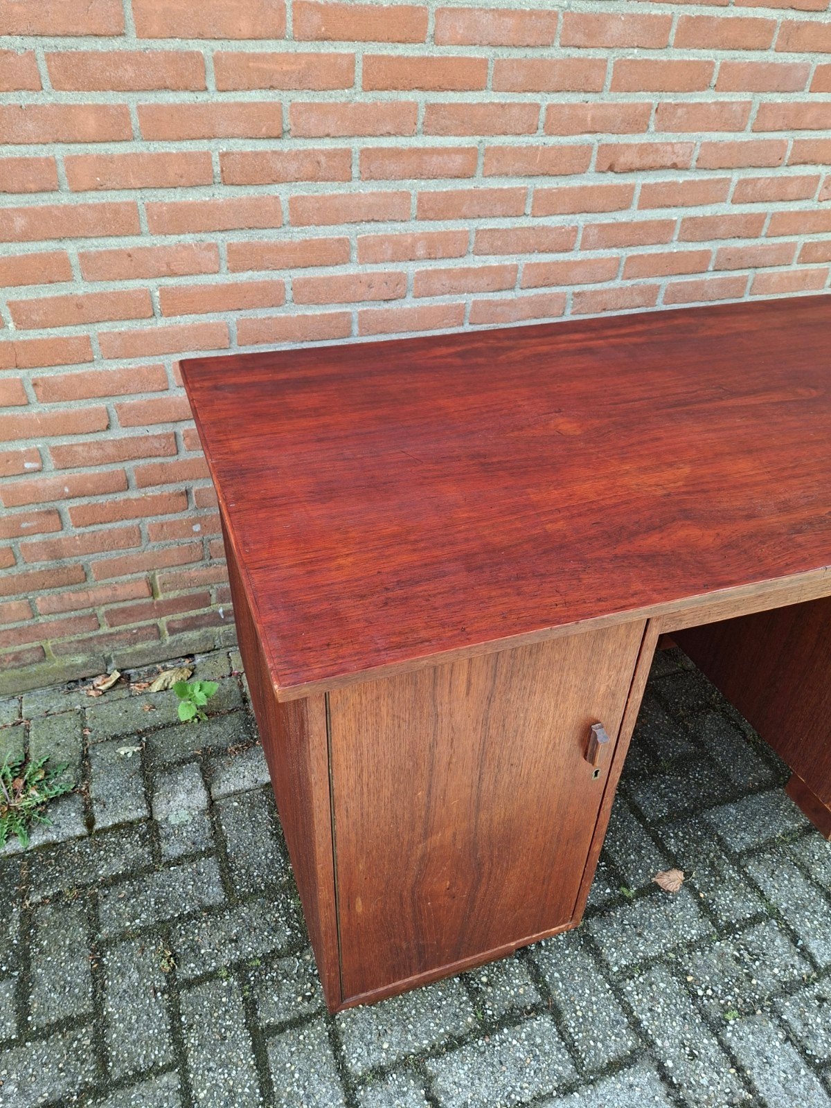bureau teak, Ophalen
