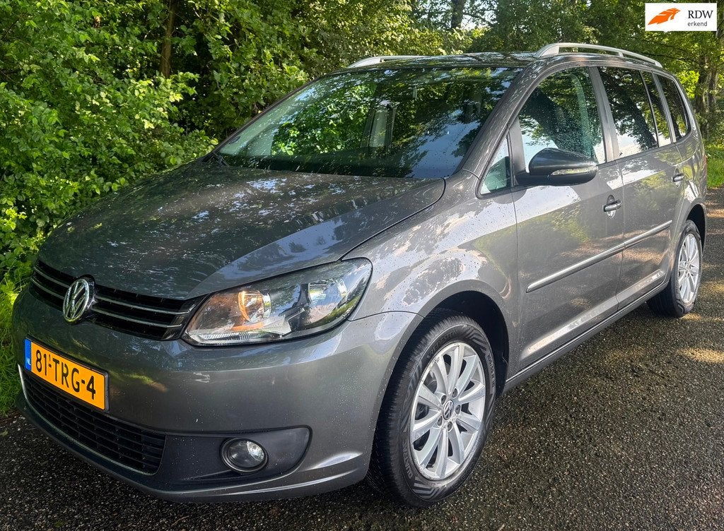 Volkswagen Touran 1.2 TSI Highline BlueMotion 7 PERS 2012 NA, Voorwielaandrijving, Euro 5, Stof, Gebruikt