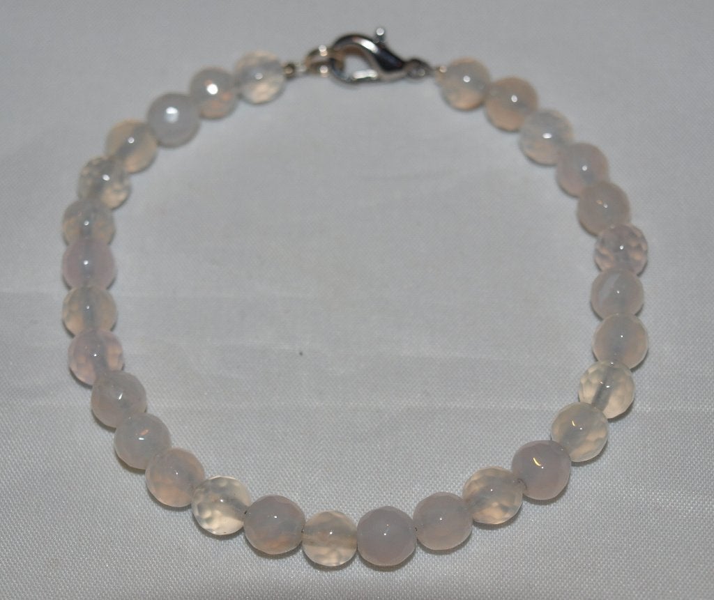 Elegante kralenarmband met zilverkleurige sluiting, Overige materialen, Nieuw, Ophalen of Verzenden, Roze