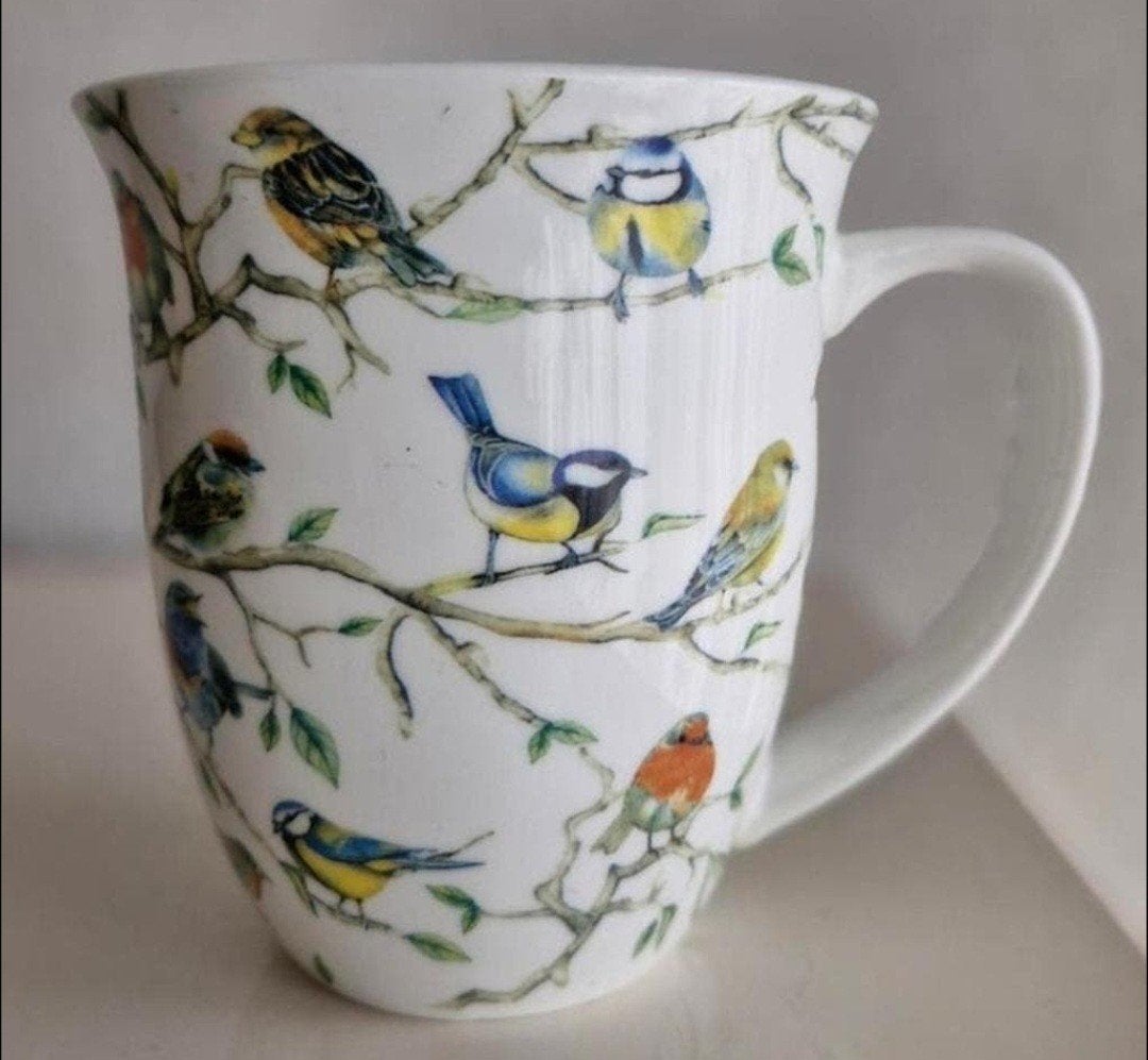 Mok met vogelprint - Fine Bone China - Ambiente, Ophalen of Verzenden, Zo goed als nieuw, Overige stijlen, Kop(pen) en/of Schotel(s)
