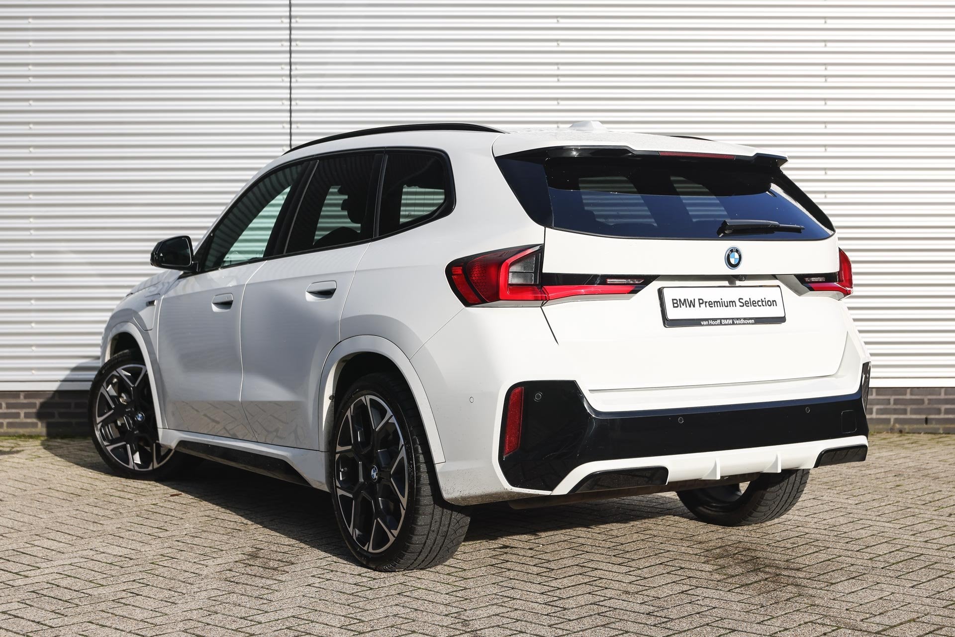 BMW X1 xDrive30e High Executive M Sport Automaat / Trekhaak, Auto's, Wit, Leder, Bedrijf, Hybride Elektrisch/Benzine