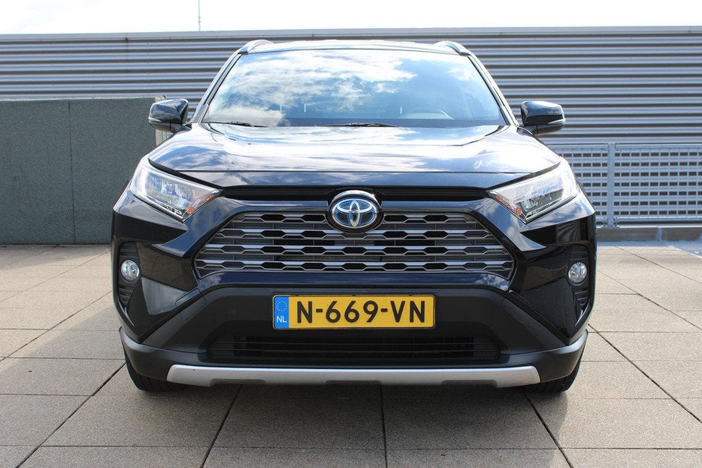 Toyota RAV4 2.5 Hybrid Business Carplay-android Auto / Navig, Auto's, Stof, Gebruikt, Euro 6, 4 cilinders