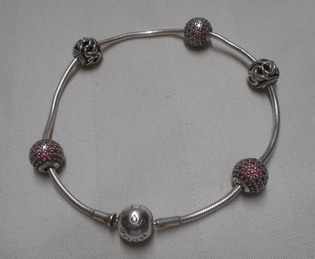 Zilveren Pandora armband met 5 bedel stoppers nr.1549, Sieraden, Tassen en Uiterlijk, Armbanden, Verzenden, Zo goed als nieuw