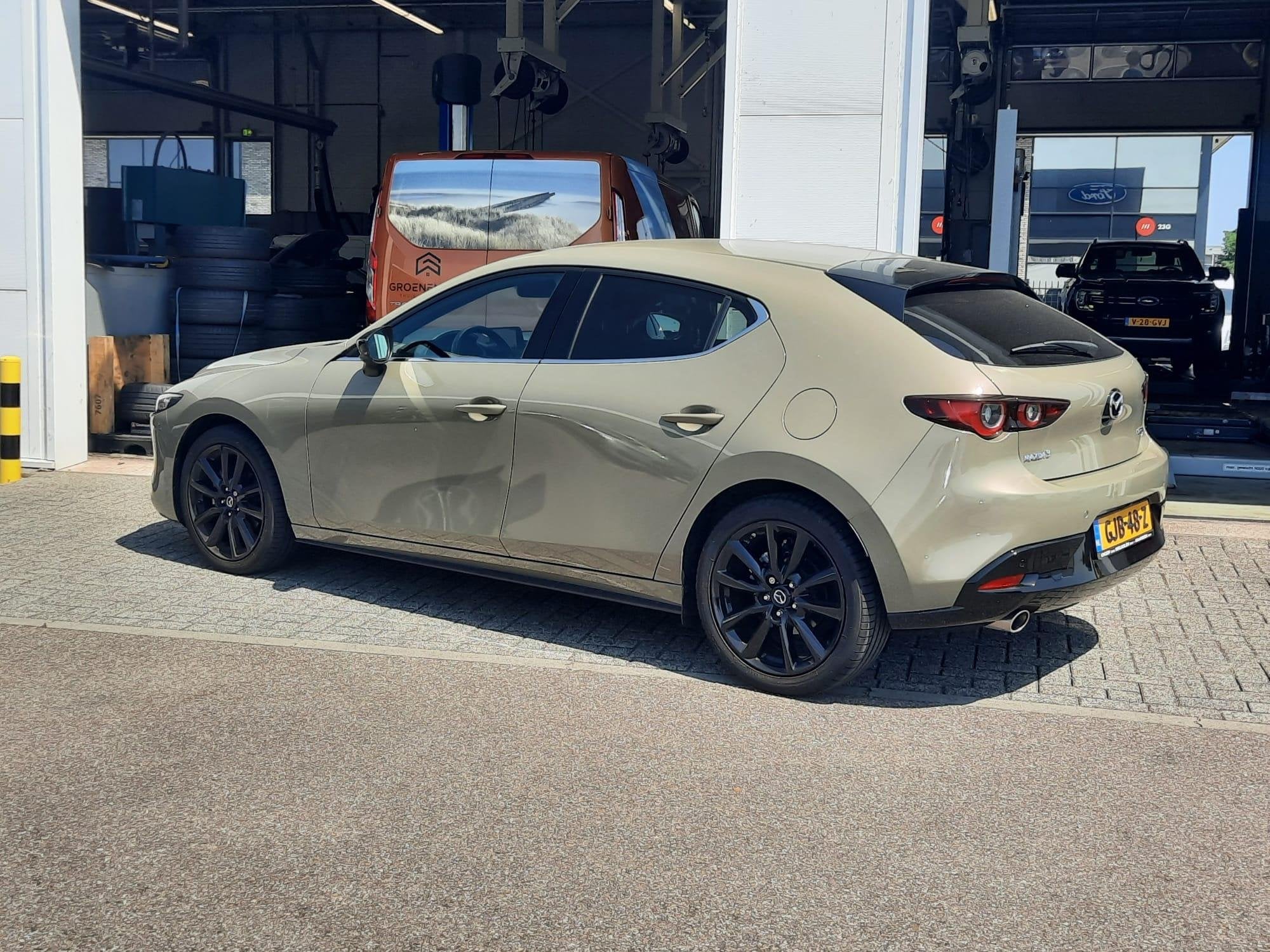 Mazda 3 2.0 e-SkyActiv-G M Hybrid 150 Nagisa | Leer | Bose S, Auto's, Mazda, Gebruikt, Euro 6, 4 cilinders, 600 kg