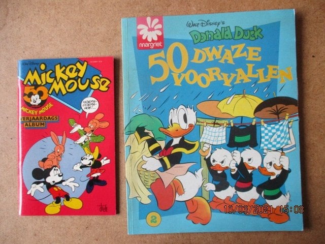 adv0327 donald d en mickey m, Boeken, Eén stripboek, Ophalen, Gelezen