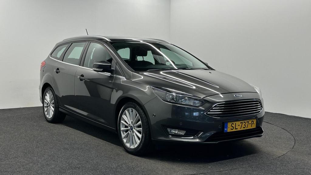 Ford Focus Wagon 1.0 Titanium NAVIGATIE ECC CRUISE LM., Auto's, Gebruikt, Met garantie (alle), Origineel Nederlands, Handgeschakeld