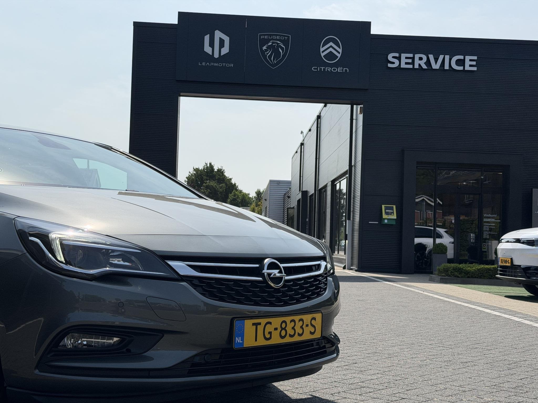 Opel Astra Online Edition 1.0 105PK Navigatie, Parkeersensor, Auto's, Stof, Gebruikt, 23 km/l, Origineel Nederlands