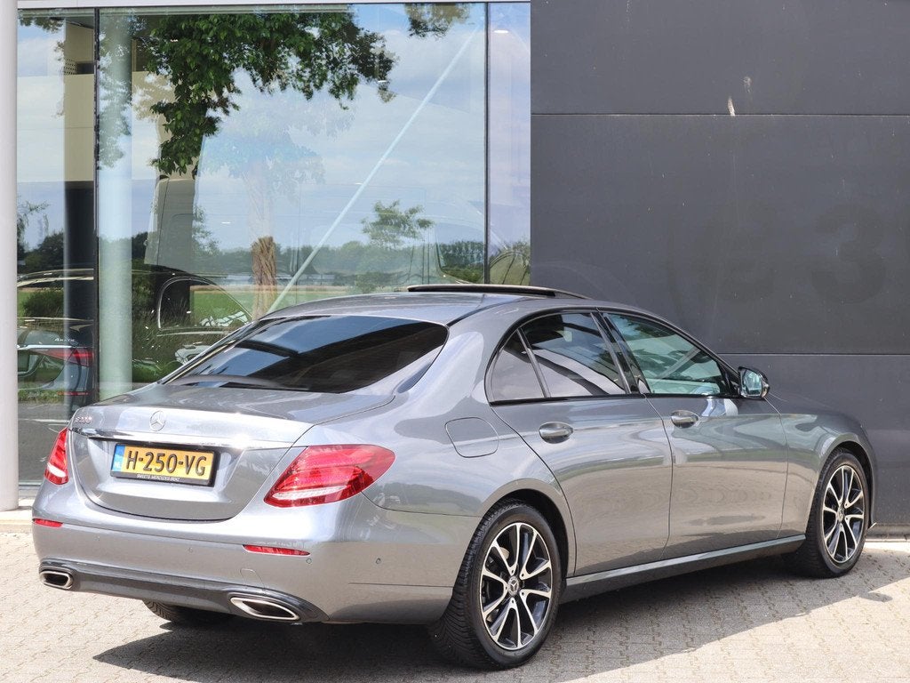 Mercedes-Benz E-klasse 200 Premium, Auto's, 12 maanden, Gebruikt, 4 cilinders, Leder en Stof