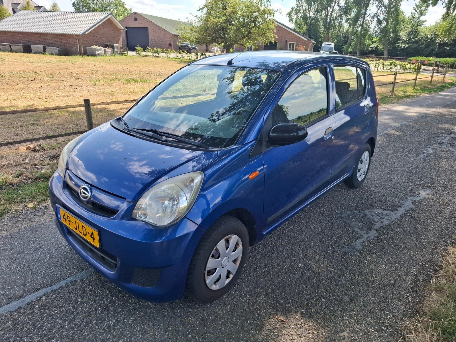 Daihatsu Cuore 1.0 5D 2009 Blauw, Auto's, Daihatsu, Voorwielaandrijving, 600 kg, 18 €/maand, Cuore