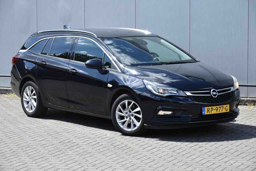 Opel Astra Sports Tourer 1.0 Business Executive Clima Navi, Auto's, Voorwielaandrijving, Stof, Gebruikt, 1178 kg
