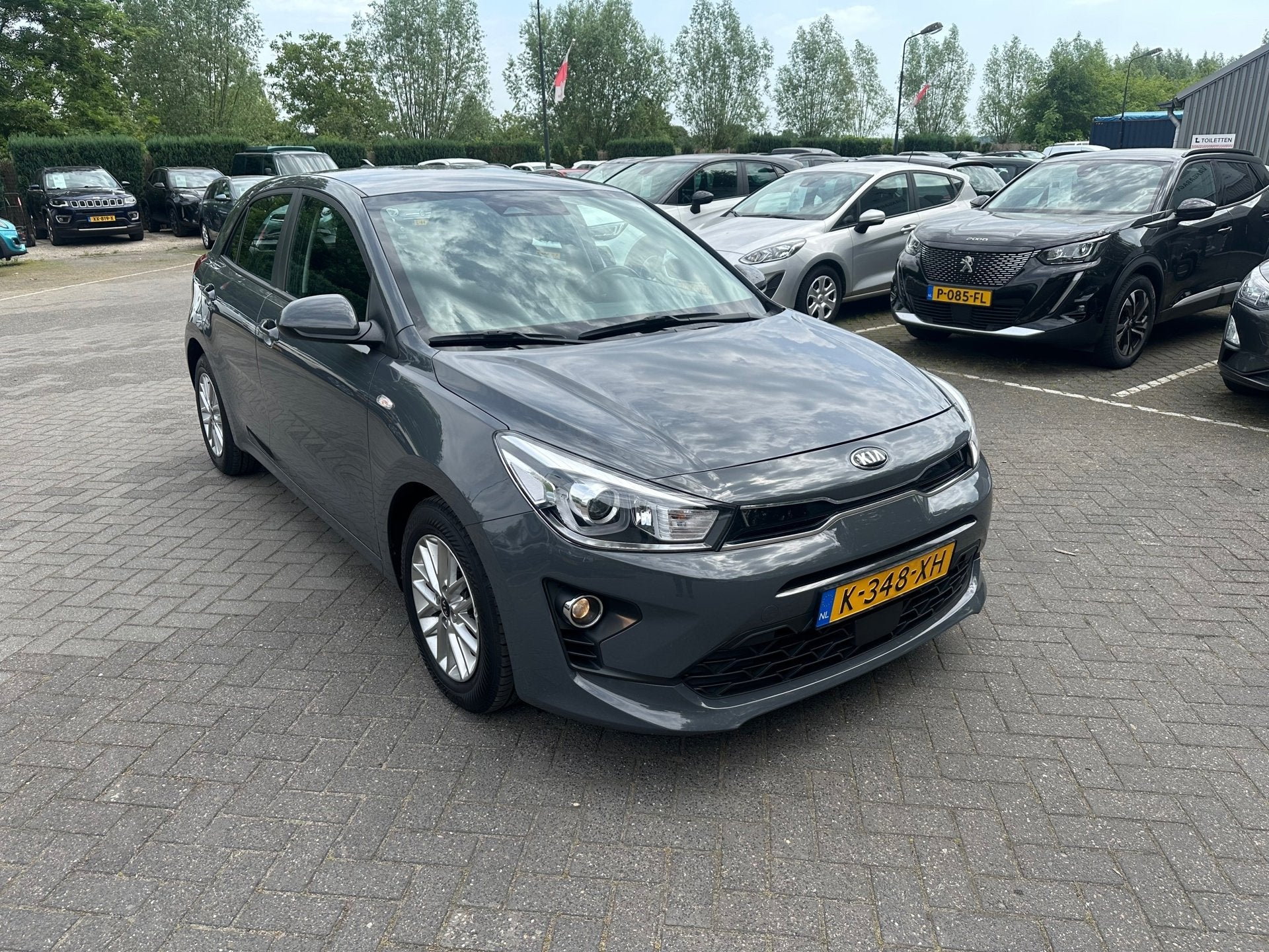Kia Rio 1.0 T-GDi MHEV DynamicLine , navigatie , pdc met cam, Auto's, Voorwielaandrijving, Dealer onderhouden, 450 kg, Gebruikt