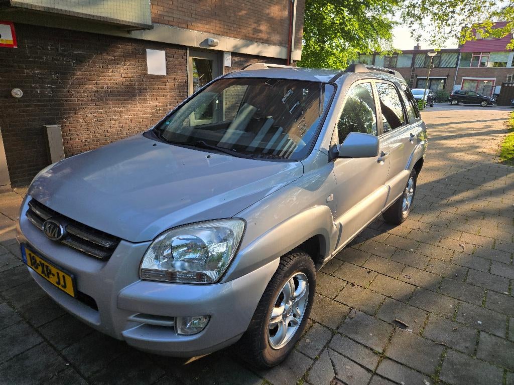 Kia Sportage 2.0 2WD 2007 Grijs, Auto's, Kia, 1442 kg, 75 €/maand, Handgeschakeld, Grijs