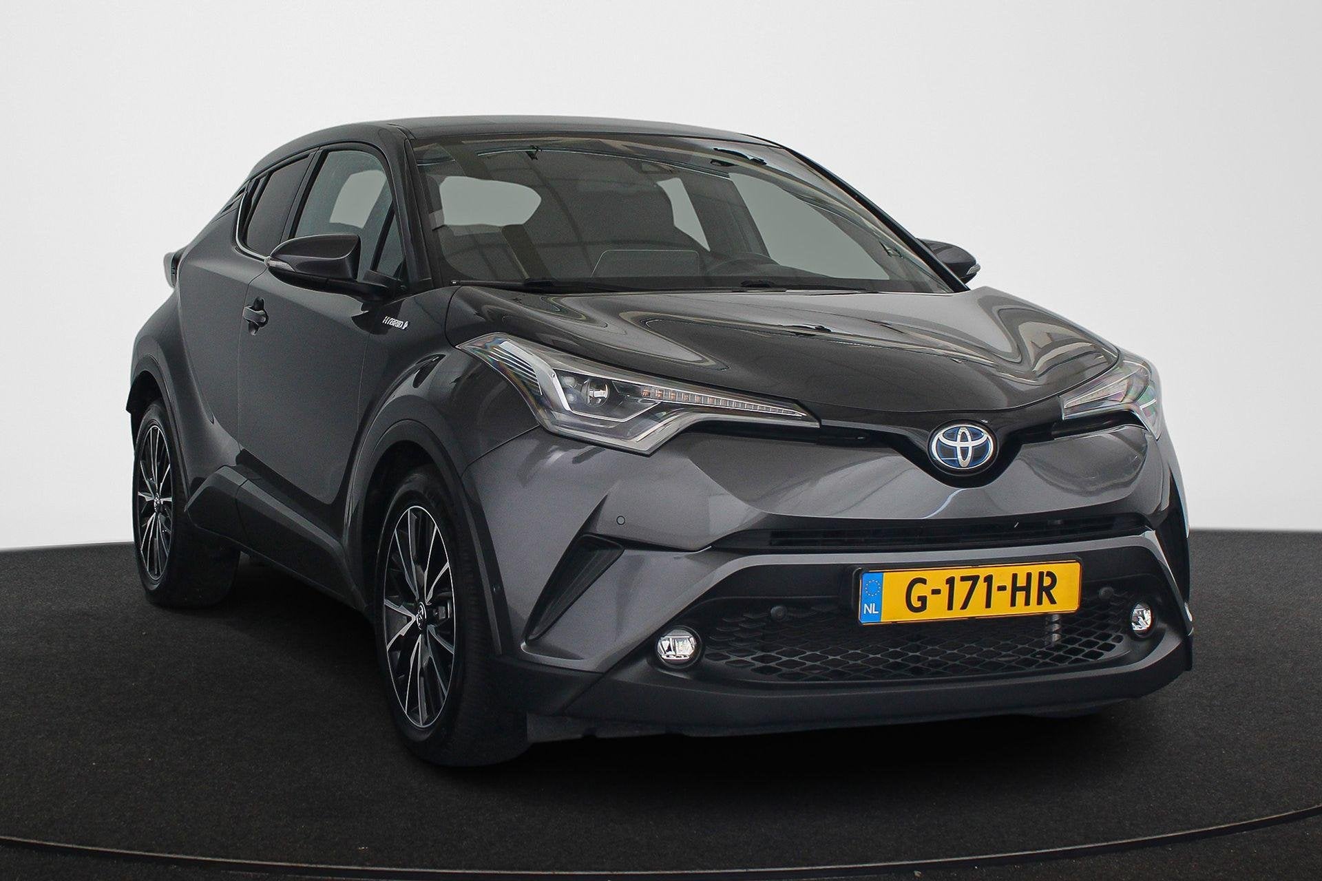 Toyota C-HR 1.8 Hybrid Executive Ultimate Stoel-Stuurverwarm, Automatische klimaatregeling, 4 cilinders, Leder en Stof, 122 pk