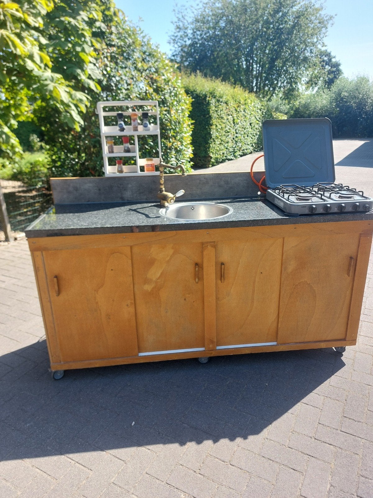 verrijdbare buitenkeuken, Ophalen