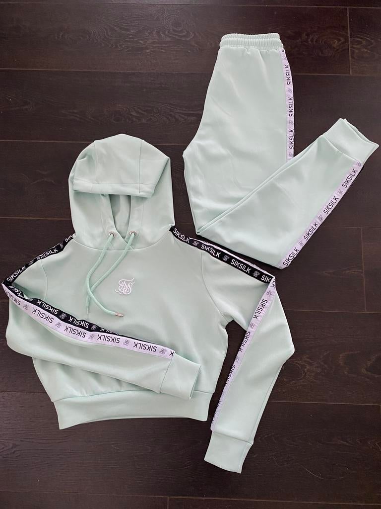 Mooi joggingpak met broek en cropped hoodie Xs 34, Kleding | Dames, Overige typen, Ophalen of Verzenden, Zo goed als nieuw, Maat 34 (XS) of kleiner