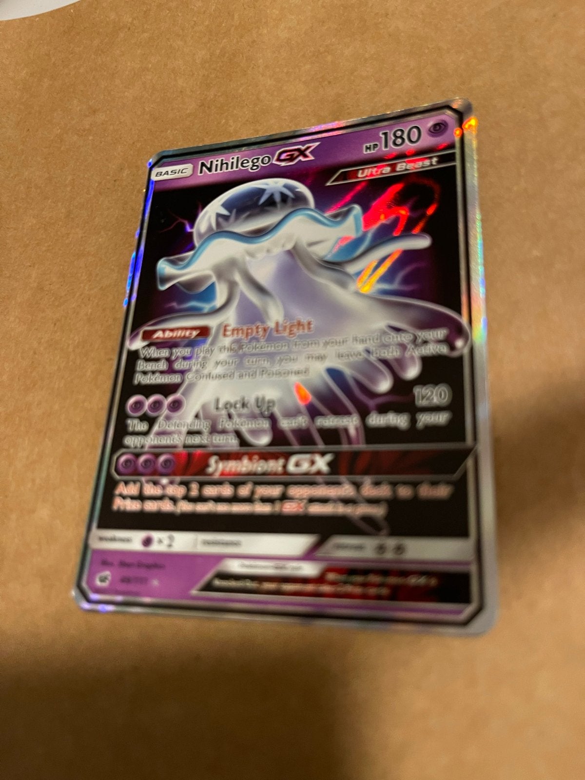Nihilego GX - Ultra rare Sun and Moon, Ophalen of Verzenden, Nieuw, Losse kaart, Foil