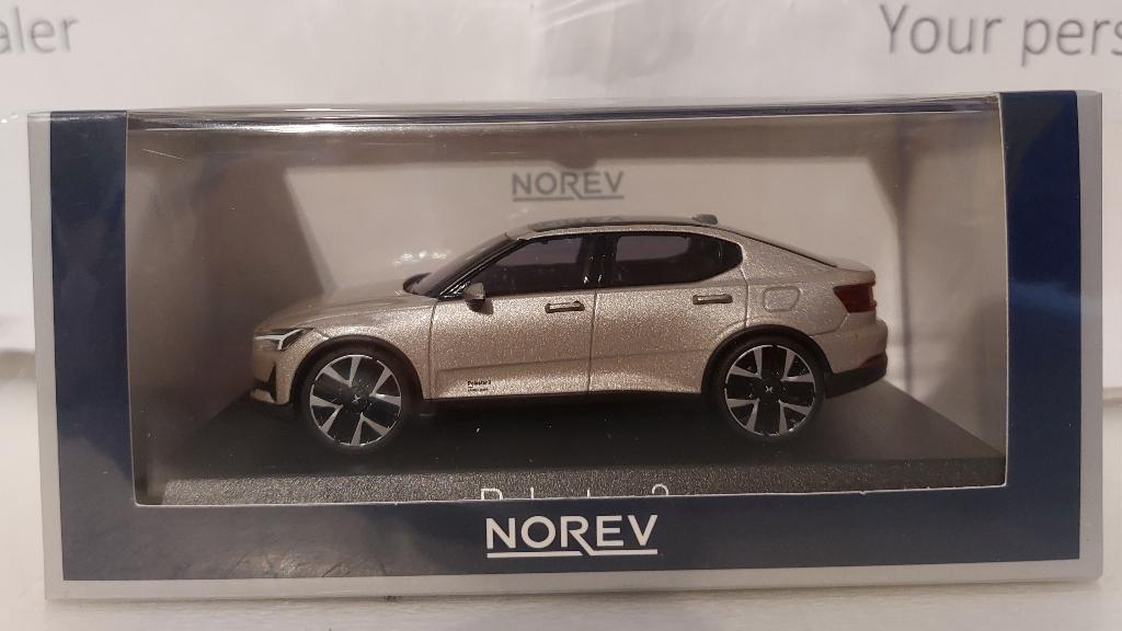 Norev 1:43 Polestar 2 2024 jupiter metallic nieuw in display, Hobby en Vrije tijd, Modelauto's | 1:43, Ophalen of Verzenden, Nieuw