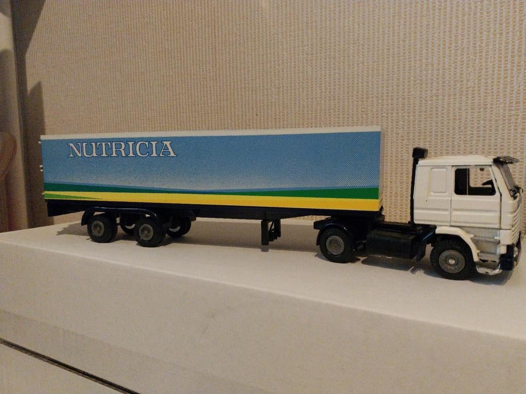 Tekno Scania 142m V8 Nutricia Chocomel, Hobby en Vrije tijd, Modelauto's | 1:50, Ophalen of Verzenden, Zo goed als nieuw, Bus of Vrachtwagen
