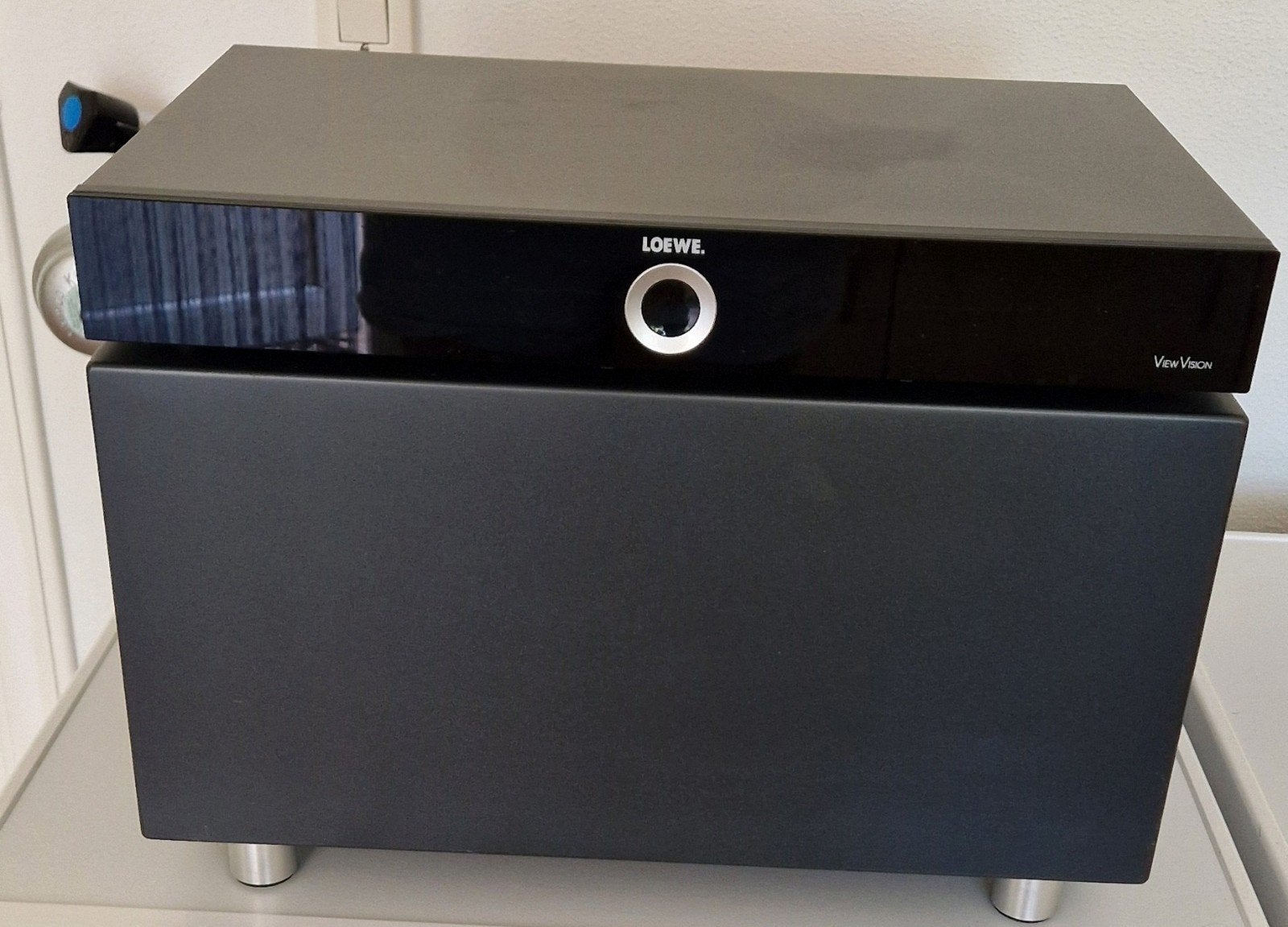 Loewe subwoofer en DVD speler, Ophalen