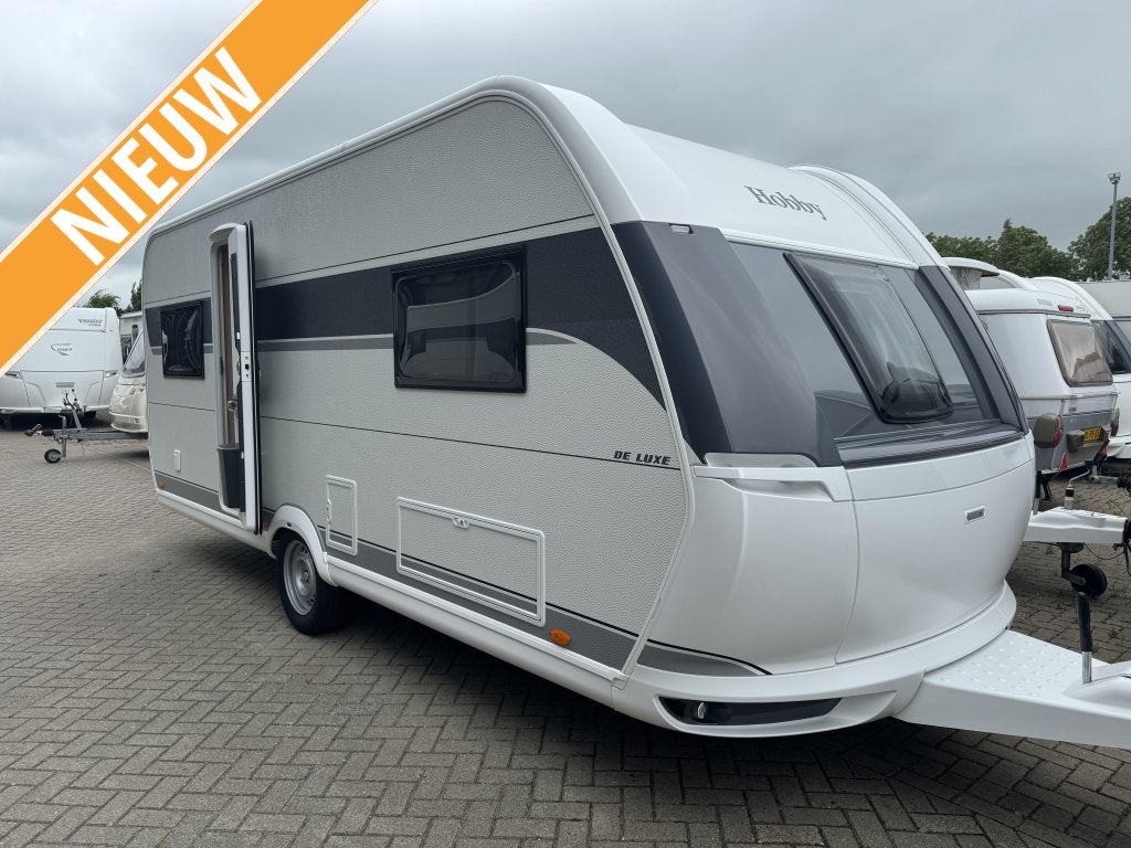 Hobby De Luxe 540 UL, Caravans en Kamperen, Caravans, Bedrijf, tot en met 4, 1250 - 1500 kg, Rondzit, Hobby, 2 aparte bedden, Overige typen
