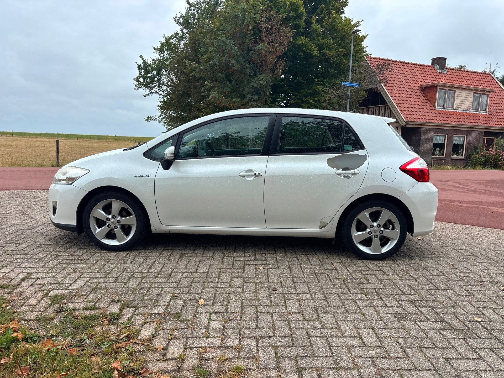 Toyota Auris 1.8 Full Hybrid Dynamic, Euro 5, Gebruikt, 4 cilinders, Wit