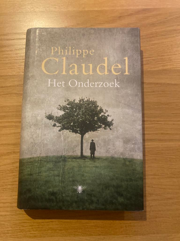 Philippe Claudel - Het Onderzoek, Ophalen of Verzenden, Zo goed als nieuw